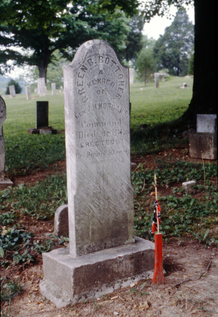 Headstone of Green B. Bottomer, a member of Gen John Hunt. Morgan's command, in Cedar Hill cemetery, 1986. Source: Regional Photographs collection, RP 031-090.
